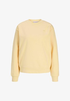 Sweatshirt jaune avec un col rond, des poignets et un ourlet côtelés. Fabriqué en tissu doux, avec un logo subtil sur la poitrine.