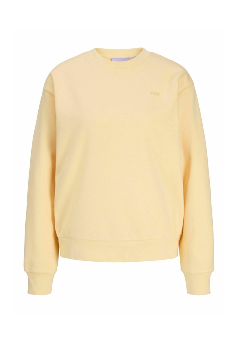 Gul genser med rund hals, ribbestrikkede mansjetter og kant. Laget av mykt stoff, med en subtil logo på brystet.