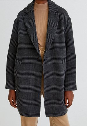 Trench - mottled black