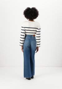 Tommy Hilfiger WIDE LEG - Wide leg - blue denim