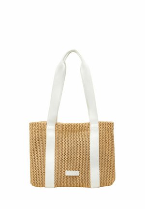Woven straw tote bag in beige with white fabric handles, featuring a rectangular shape and a subtle logo detail on the front.