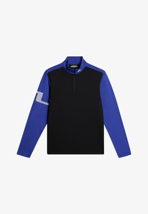 Zwart en blauwe langhangende top met een kwart ritssluiting, met een gestructureerd zwart lijf en effen blauwe mouwen met een gestreepte accent.