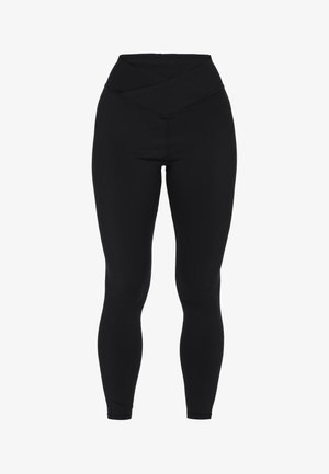 Leggings noirs avec une taille haute à chevauchement. Fabriqués en tissu extensible avec une texture lisse et une silhouette ajustée. Aucun motif visible.
