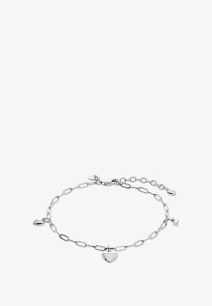 Bracciale d'argento con catene allungate e tre piccoli ciondoli a forma di cuore pendenti. Il design include un moschettone e lunghezza regolabile.