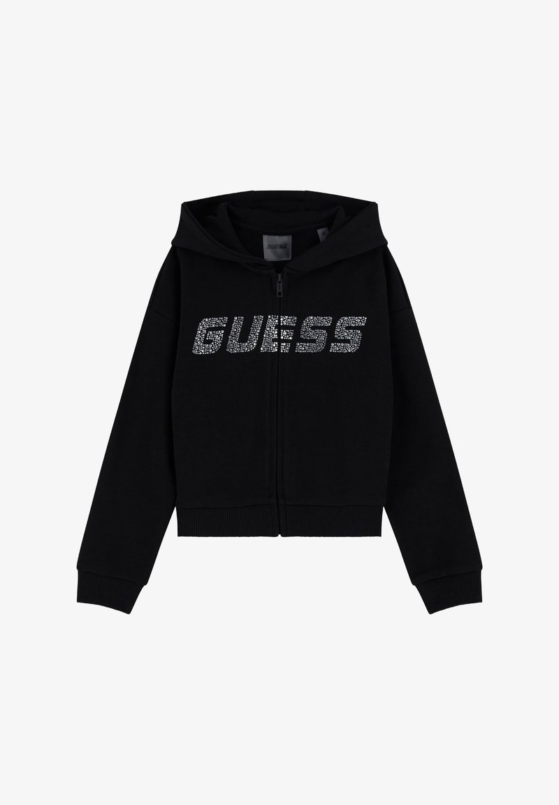 Felpa nera con zip realizzata in tessuto morbido, dotata di cappuccio, polsini a coste e un logo scintillante "GUESS" in argento sul petto.