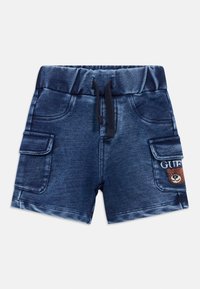 Τζιν σορτς με ελαστική μέση και κορδόνι. Διαθέτει δύο πλαϊνές τσέπες και μία τσέπη με κέντημα αρκούδας και το κείμενο "GUF".