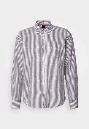 Long-sleeve button-down shirt in white and gray vertical stripes, featuring a classic collar and single chest pocket. Fabric appears textured.