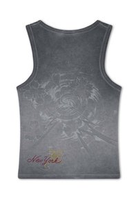 Gray sleeveless top with subtle floral and lightning bolt patterns and "New York" text in red and yellow at the bottom left.