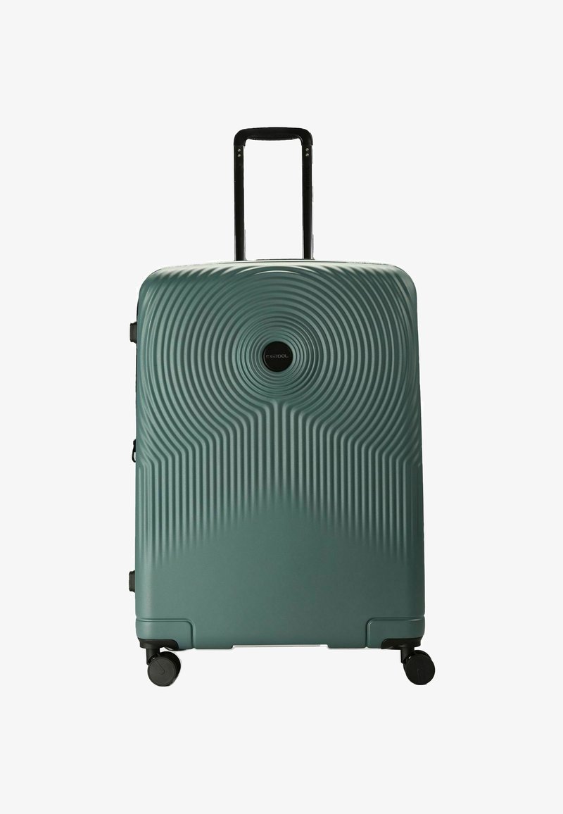 Valise rigide verte avec des motifs texturés circulaires et linéaires, quatre roues noires et une poignée télescopique noire extensible.