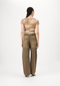 BDG Urban Outfitters LOGAN  - Wide leg - rust tint