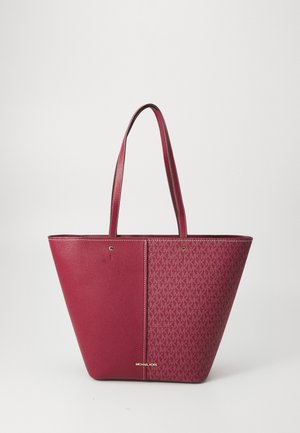 Tote bag with two long handles, half solid textured dark red leather and half patterned fabric with "MK" logo, Michael Kors branding at bottom.