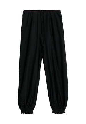 Pantalon noir coupe ample avec poignets élastiques et taille à cordon, avec des détails cousus subtils près des poignets.