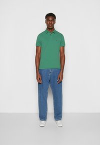 Tommy Hilfiger REGULAR - Polo - central green