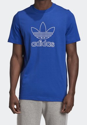 Blauwe katoen t-shirt met een witte Adidas-logo en een driebladig ontwerp op de voorkant; korte mouwen, ronde hals en standaard pasvorm.