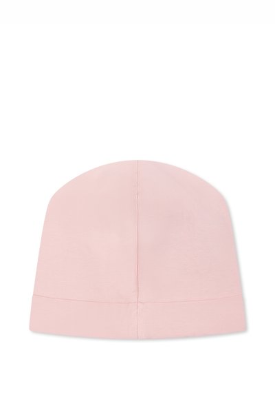 Beanie in cotone rosa chiaro con design senza cuciture e texture morbida, caratterizzato da una parte superiore arrotondata e un risvolto alla base.