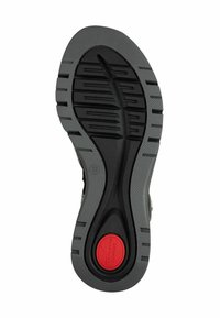 Schoenzool met een gestructureerd zwart rubberen oppervlak, voorzien van een centraal rood cirkelaccent en duidelijke loopprofielen voor grip. Maat 37 aangegeven.