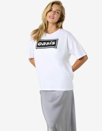 Balta medvilninė marškinėliai su juodu stačiakampio formos logotipu, ant kurio parašyta "oasis" priekyje. Laisvas kirpimas, trumpomis rankovėmis ir paprastas dizainas.