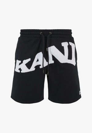 Black shorts made of cotton blend with an elastic waistband and drawstring. Features a large white terry cloth "KAN" logo on the side.