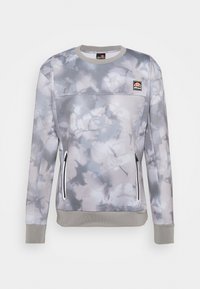 Sudadera de teñido anudado en gris y blanco, con cuello redondo, bolsillos laterales con cremallera y puños y dobladillo acanalados. Presenta un pequeño logo en el pecho.
