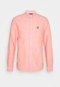 Overhemd met lange mouwen in zachtroze stof. Heeft een klein geel vlinderlogo op het linkerborstzakje. Button-down kraagontwerp.