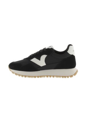Black suede and synthetic sneakers feature a white accent logo, rounded toe, sturdy rubber sole, and textured detailing on the sides.