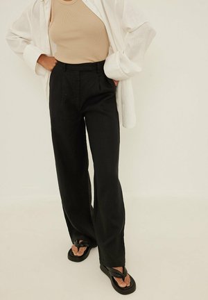 WEITEN BEINEN - Chino - black