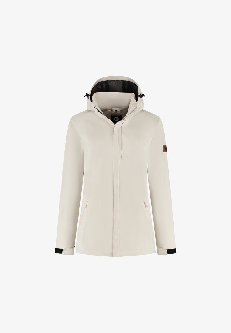 Veste beige légère avec capuche, devant zippé, accents noirs aux poignets et deux poches latérales ; présente un patch de marque sur la manche.