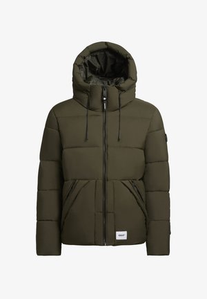 Olive green puffer jacket with a high collar and adjustable drawstrings. It features zippered front pockets and a logo patch at the hem.