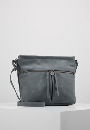 Sac bandoulière gris avec poche avant zippée et deux curseurs, sangle réglable et finition mate lisse sur fond blanc.