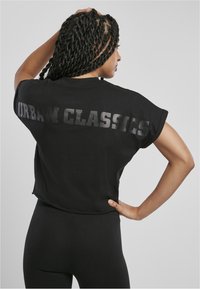 T-Shirt Donna Urban Classics In Jersey Lavato - Morbida E Casual, Con Tasca Sul Petto, Cotone E Poliestere - 2