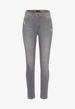 Hochtaillierte, schmal geschnittene graue Jeans mit leichten Abriebstellen in der Nähe der Taschen, vorderem Knopf, Gürtelschlaufen und verblassten Oberschenkel-Details.