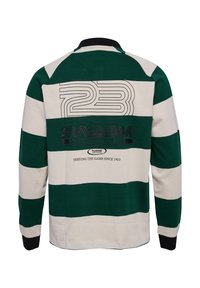 Randig långärmad rugbytröja i grön och kräm, med numret "23" och "SWARM INTERNATIONALS" tryckt på baksidan. Svarta muddars.