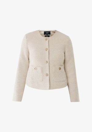 Blazer di tweed beige con scollatura rotonda, maniche lunghe, quattro bottoni dorati e due tasche frontali. Tessuto testurizzato con un motivo intrecciato.