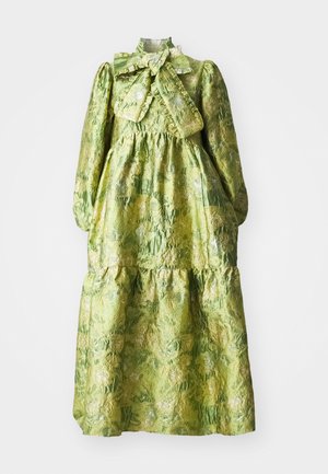 Green long-sleeve dress featuring a high collar, tiered design, and a textured floral pattern. Includes a large bow at the neckline.
