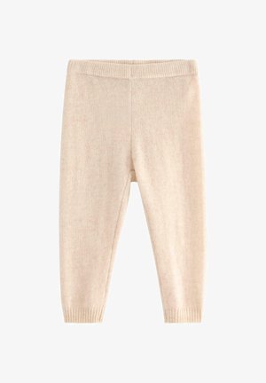 Fleece leggings in soft beige with a ribbed waistband and cuffs, featuring a smooth texture and straight-leg design.