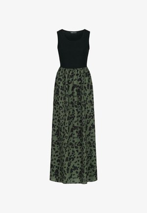 Maksimālās griezuma kleita ar melnu pieguļošu augšu un zaļu leoparda raksta svārku. Iezīmē bezpiežu dizains, mīksta tekstūra un plūstoša silueta.