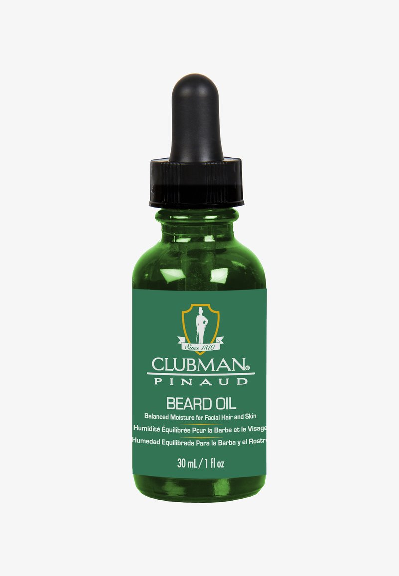 Grüne Glasflasche mit schwarzem Tropfverschluss, beschriftet mit "Clubman Pinaud Beard Oil", mit weißen Texten und einem Logo. Enthält 30 ml.