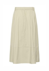 Jupe beige clair, longueur au genou, avec taille élastique, passants de ceinture et détails de coutures subtils sur la moitié inférieure.