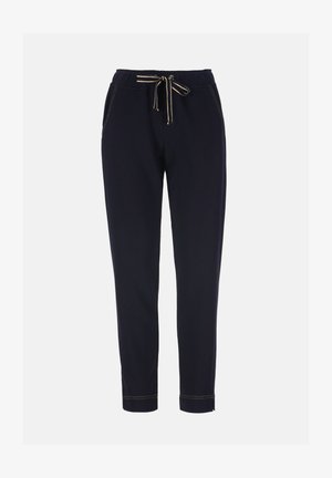 Temno modre figurirane športne hlače z elastiko v pasu, črtastim vrvico za zatezanje, stranskimi žepi in vidnimi šivi na robovih in šivih.