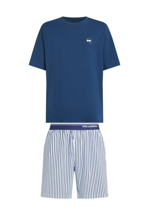 T-shirt en coton bleu avec col rond et logo. Associé à un short de lounge rayé blanc et marine avec une taille élastique et un logo.