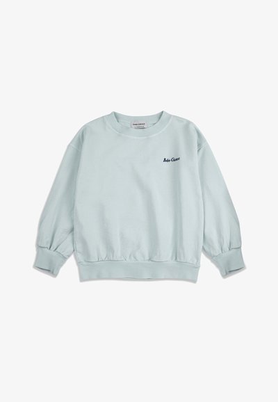 Sweat-shirt bleu clair à manches longues avec poignets et ourlet côtelés, arborant "Bobo Choses" brodé sur la poitrine gauche.