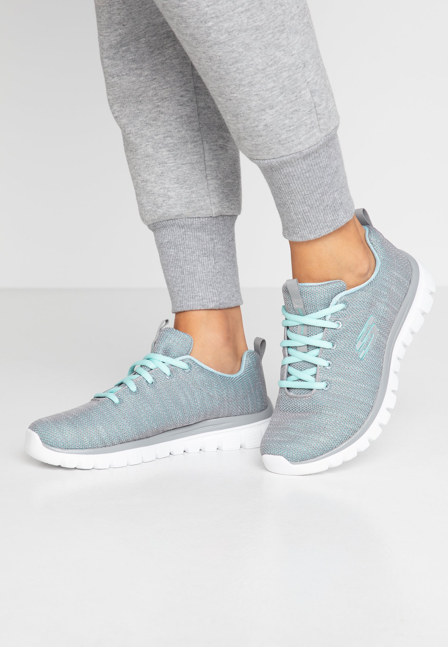 skechers wide fit trainers uk