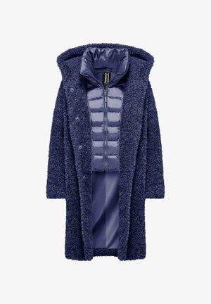 Marineblauwe jas met een fluffy buitenste textuur, een gevoerde binnenlaag en een ritsluiting met een hoge kraag en drukknoopjes.