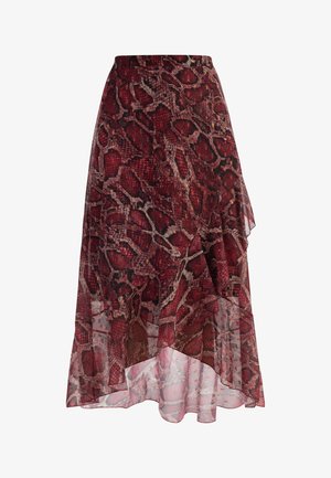Lang, asymmetrisk nederdel i gennemsigtig rød stof med et slangeskinds mønster. Har lagdelte flæser og en figursyet talje.