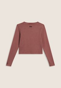 Top a maniche lunghe a coste di colore rosa polvere. Presenta uno scollo rotondo e un sottile logo Disney nero sul retro. Tessuto morbido ed elastico.