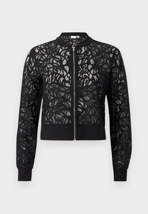 Veste bomber noire en tissu de dentelle florale, fermeture zippée, poignets et ourlet côtelés. Le design présente des motifs complexes et une silhouette courte.