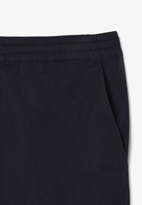 Lacoste Bukser - bleu marine hde