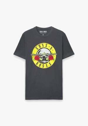 Maglietta grigia in cotone con un logo circolare giallo, "GUNS N' ROSES", con un teschio, rose e una pistola al centro. Taglia XL.