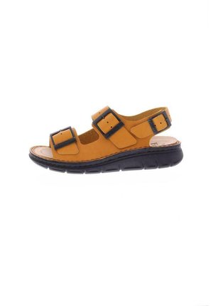 Leren sandalen in bruin met twee zwarte verstelbare gespen, kurken voetbed en een gevoerde zwarte rubberen zool, met een ronde vorm.