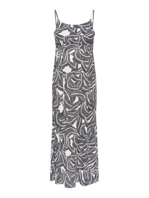 Sleeveless maxi dress with thin straps featuring a black and white abstract leaf pattern on a light background.